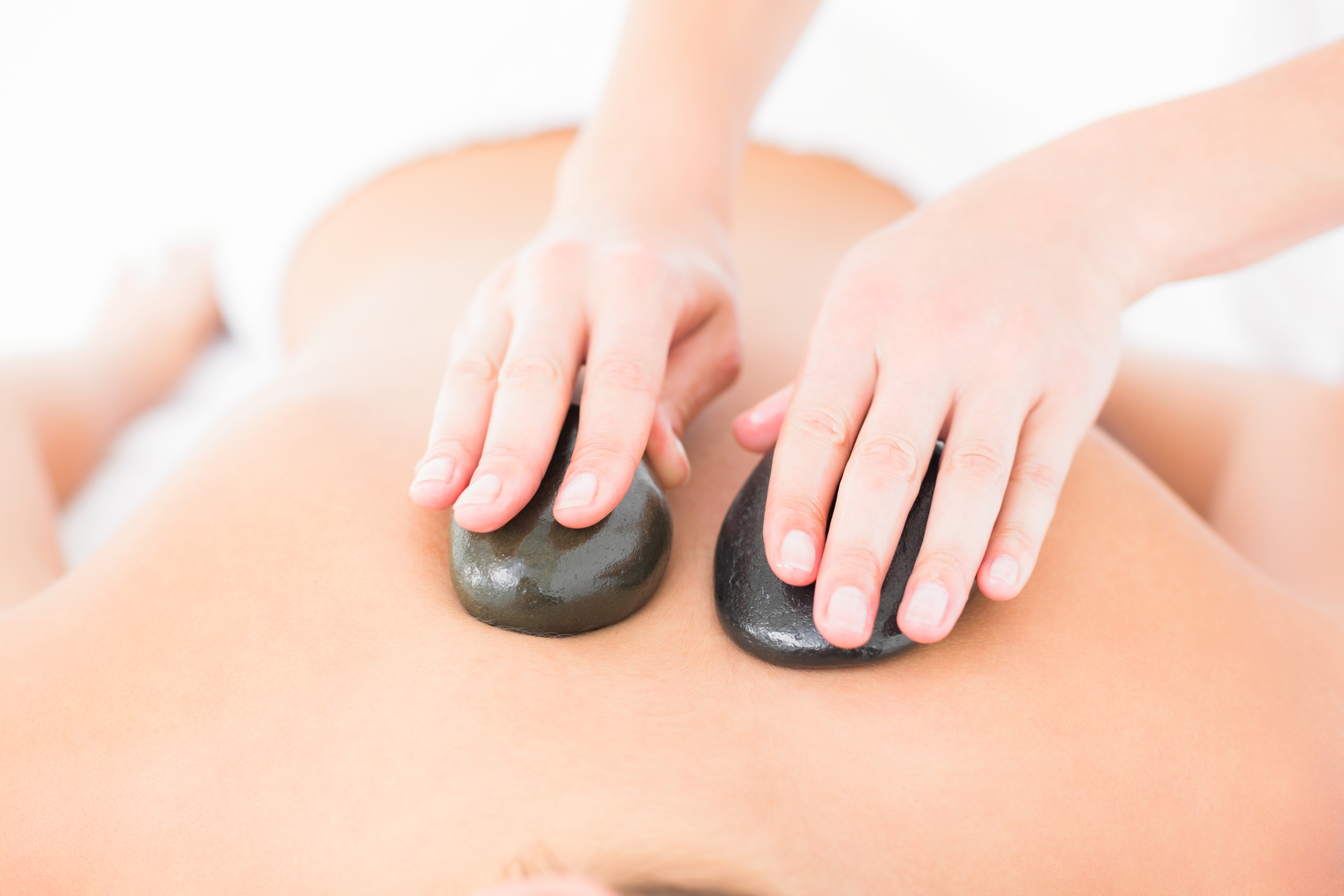 Hot Stone Massage Moondance Wellbeing Angelique Bavich Massage Therapy Reflexology Bunbury